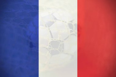 Arka plan, spor ve başarı konsepti olarak kalede futbol topu bulunan Fransa bayrağı.