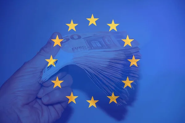 Money Hand Flare European Flag —  Fotos de Stock