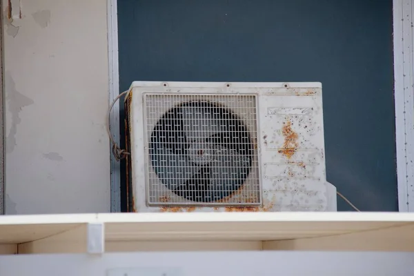 Old rusty air conditioner unit
