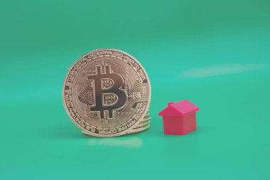 Minyatür evleri olan Bitcoin, kripto parasıyla satın alma kavramı .