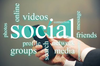 Business man holding a smart phone using social to advertise his company.
