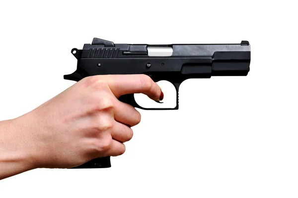 Pistola negra en una mano — Foto de Stock