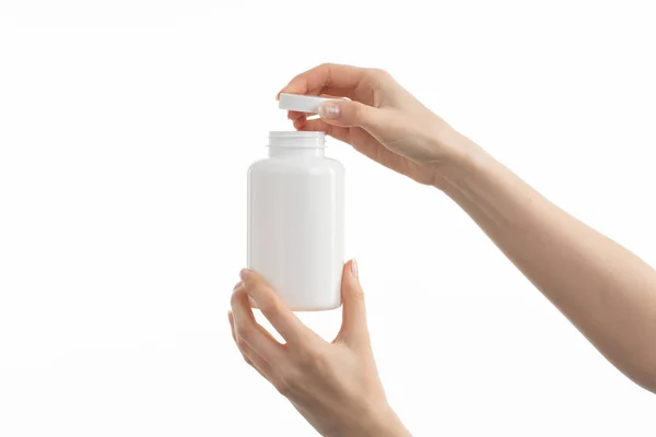 Közelkép Kezében Egy Fehér Üveg Gyógyszert Tabletták Vagy Vitaminok Vagy — Stock Fotó