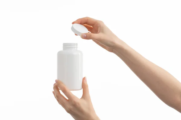 Közelkép Kezében Egy Fehér Üveg Gyógyszert Tabletták Vagy Vitaminok Vagy — Stock Fotó