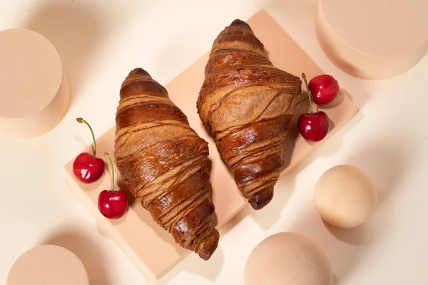 Freshly Backed French Croissant Exposed Decorative Blocks Delicious Cherry Side — 图库照片