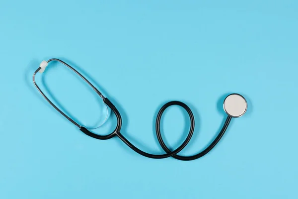 Black Stethoscope Top View Blue Background Medical Equipment Tool Measuring — Fotografia de Stock