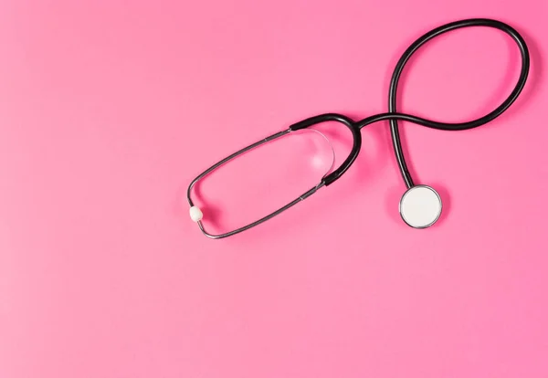 Top View Black Stethoscope Pink Background — Fotografia de Stock