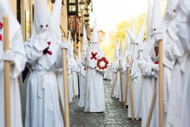 The extraordinary Christian procession of the Holy Week in Granada, Andalucia, Spain.