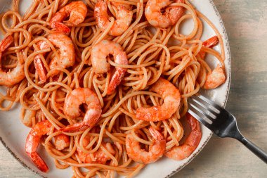 Spaghetti with king shrimps , with spices, top view, selective focus, homemade, no people,
