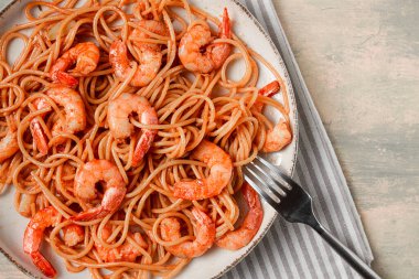 Spaghetti with king shrimps , with spices, top view, selective focus, homemade, no people,