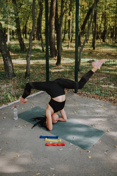 Young Girl Black Sportswear Stretching Doing Sport Park Charming Slim — Stockfoto