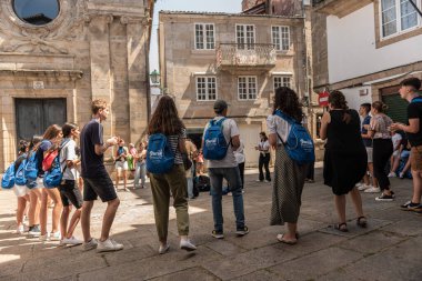 thousands of young pilgrims arrive in Santiago de Compostela to complete the Way of santiago in summer 2022