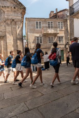 thousands of young pilgrims arrive in Santiago de Compostela to complete the Way of santiago in summer 2022