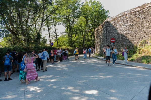 thousands of young pilgrims arrive in Santiago de Compostela to complete the Way of santiago in summer 2022