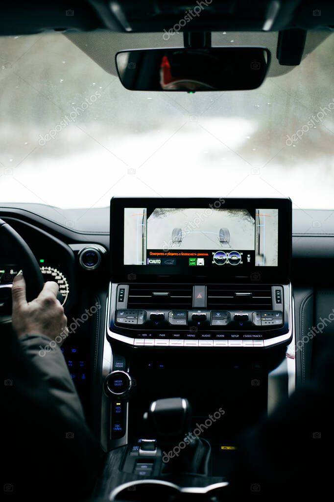 Modern car dashboard. Screen multimedia system. Interior detail.