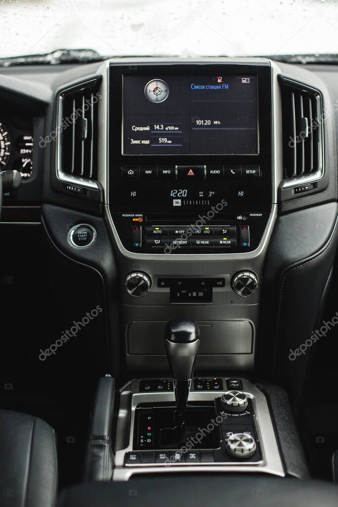 Modern car dashboard. Screen multimedia system. Interior detail.