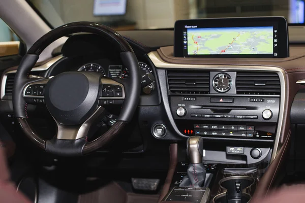 Car interior luxury steering wheel. Dashboard, climate control, display — Stock Photo, Image