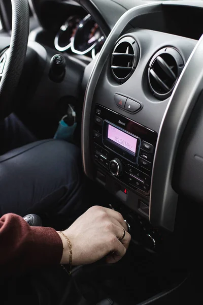 Car interior, elegant man, hand on a gear shift lever — Stock Photo, Image