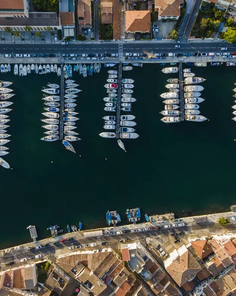 Aerial view of sailing boats anchored along the river in Martigues canal, Provence, France.