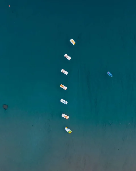 Aerial view of small boats for rent in the sea on Elba Island, Tuscany, Italy.