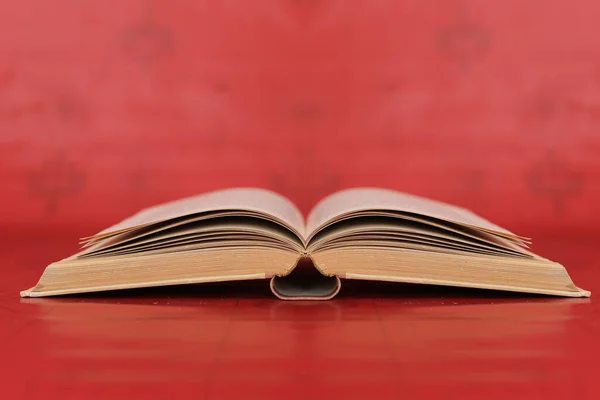 Open Book Red Background — Stock Photo, Image