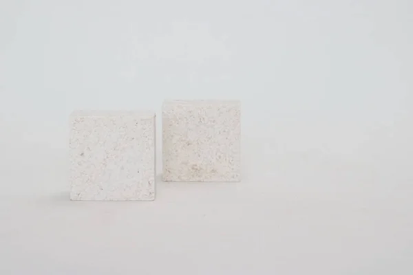 White Stone Cube White Background — стоковое фото