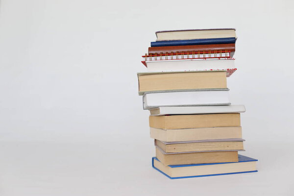 School books on white background