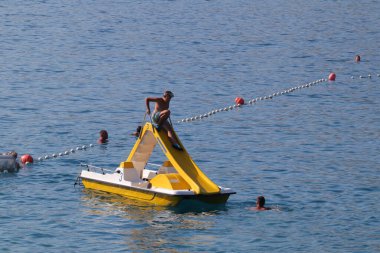 Makarska, Croatia, 03.08.2022Tourists from European countries enjoy their holidays by the sea and the beach in Makarska, a tourist resort in the south of Croatia