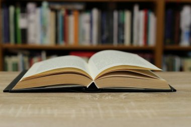 old book on the wooden desk.