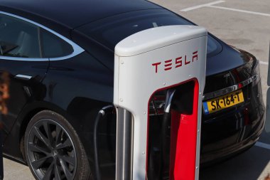 Split, croatia, 05.08.2022   Tesla car at the charging station