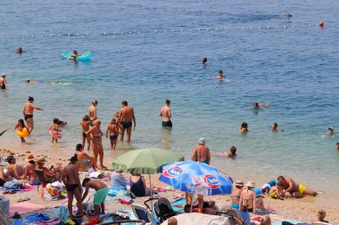 Makarska, Croatia, 11.08.2022.Tourists on the beach in Makarska in August, when Croatia records a record number of guests vacationing in Croatian tourist destinations