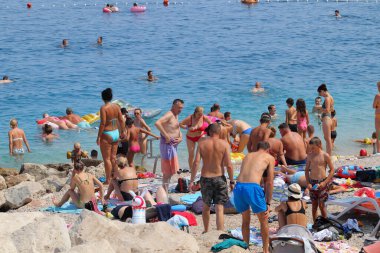 Makarska, Croatia, 11.08.2022.Tourists on the beach in Makarska in August, when Croatia records a record number of guests vacationing in Croatian tourist destinations