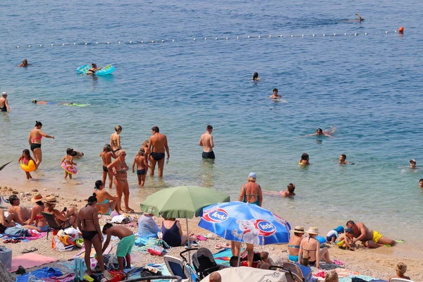 Makarska, Croatia, 11.08.2022.Tourists on the beach in Makarska in August, when Croatia records a record number of guests vacationing in Croatian tourist destinations