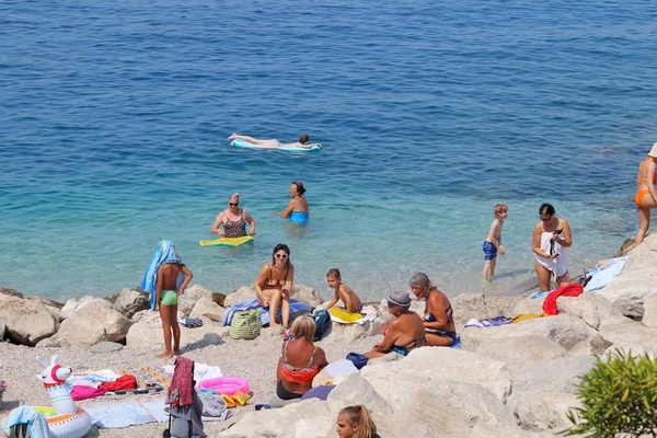 Makarska, Croatia, 11.08.2022.Tourists on the beach in Makarska in August, when Croatia records a record number of guests vacationing in Croatian tourist destinations