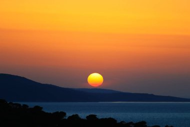Sunset over the island of Hvar, Croatian Sea