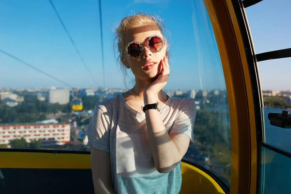 Young Woman Sunglasses Sitting Carousel Looking Camera Have Funny Time — 图库照片