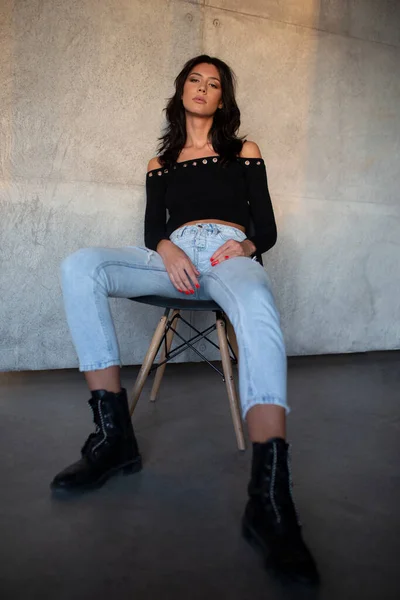 Sensual Brunette Young Woman Sit Stool Studio Portrait Concrete Grey — 스톡 사진
