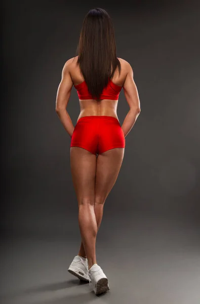 Zadní Obraz Svalnaté Atletické Mladé Ženy Červeném Sportovním Oblečení Šedém — Stock fotografie