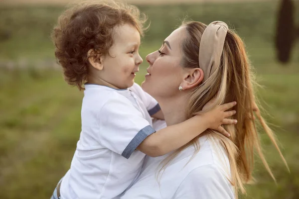 Mother Hugs Her Son Look Each Other Smile Summer Day — Stock Photo, Image