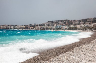 View of beautiful white sand beach with turquoise blue ocean water.