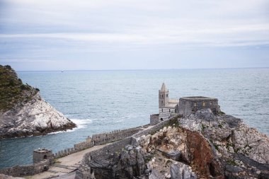 Top view of a ruins on the coast near the Mediterranean Sea, view of traditional Italian architecture.