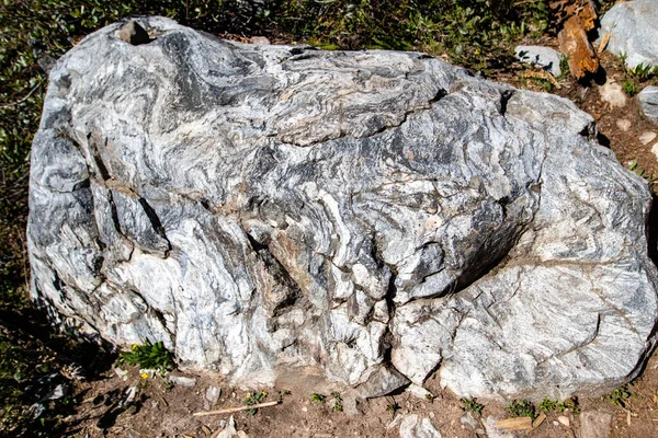 Metamorphic gneiss rock in the Grand Teton Range, Wyoming are some of the oldest rock in North America, horizontal