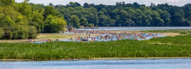Wausau, Wisconsin, USA, July, 30, 2022: 8th Annual Paddle Pub Crawl on Lake Wausau and the Wisconsin River starting at DC Everest Park, Panorama