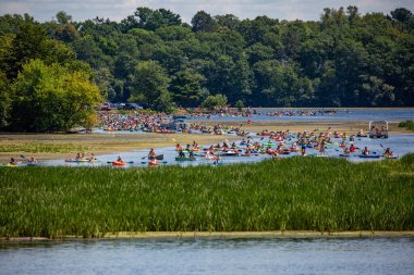 Wausau, Wisconsin, USA, July, 30, 2022: 8th Annual Paddle Pub Crawl on Lake Wausau and the Wisconsin River starting at DC Everest Park, panorama