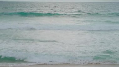 blue waves on the shores of a beach