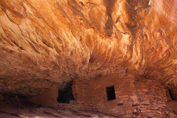 Ruins of an illusion of a house on fire