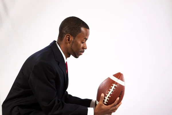 Black Man Thoughtfully Holding Football — Φωτογραφία Αρχείου