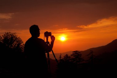 Sunsete in the Mountains with Clouds