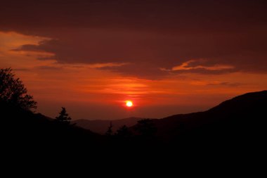 Sunsete in the Mountains with Clouds