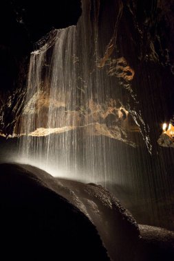 Underground waterfall with lights